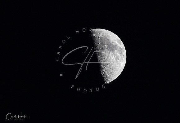 ISS crossing over the moon (the spec on the right side of the moon)